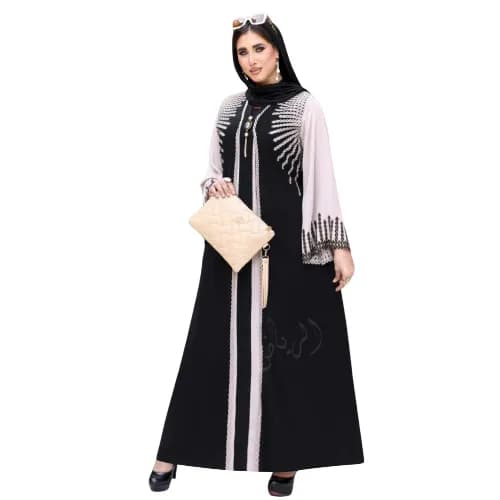 Le produit Abaya Femme Grande Taille Brodée Noir & Blanc – XL à 4XL